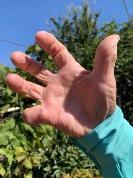 Reaching Hand with Spread Fingers Stock Photos