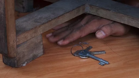 Reaching hidden house keys Stock-Footage 335192414
