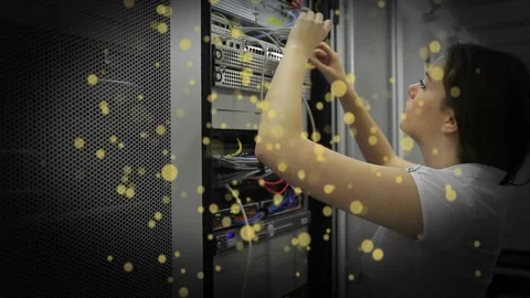 Reaching into rack, tech connecting network and power cables, tidying cables for Stock Footage 331832610