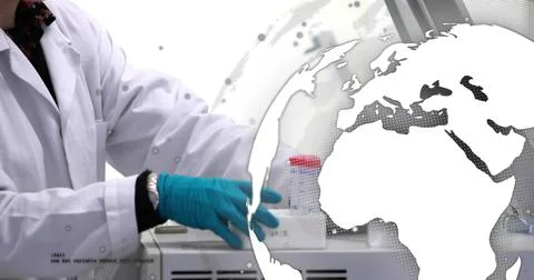 Reaching tech at bench in lab-coat, teal-gloves handling device with red-cap, Stock Photos