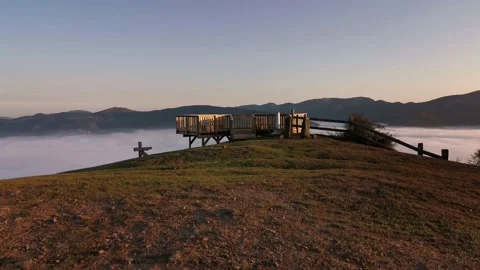 Reaching the top of the mountain at sunrise Stock Footage 140451554