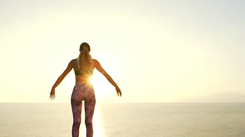 Reaching the Top. Young Woman Athlete Reaches Up for Success. Stock Footage 59035052