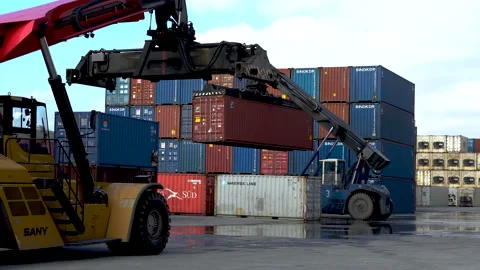 Reachstacker transports a container in front of other containers. Stock Footage 148464275