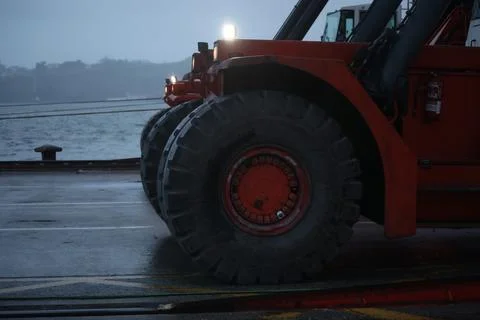 Reachstaker in rain Stock Photos