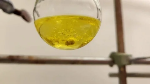 Reactants are mixing in an organic solvent closeup slow motion view in 4K  Stock Footage 115105909