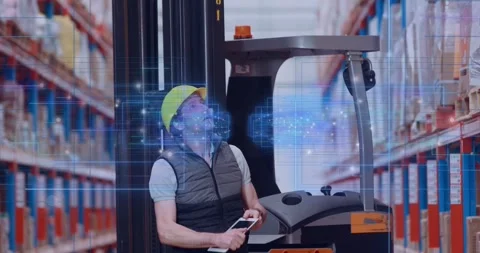 Reacting to AR in warehouse, forklift operator tapping tablet, confirming picks, Stock Footage 334115498