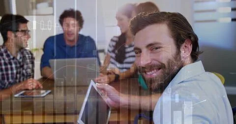 Reacting to data overlay, bearded man in collared shirt presenting at meeting Stock Photos