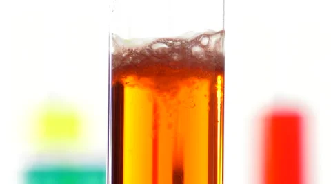 Reacting of a liquid containing sodium bicarbonate with acid Video stock 64290989