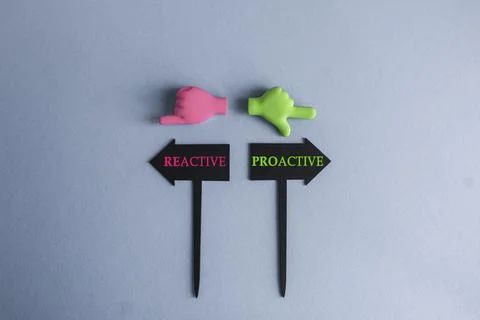 Reactive or proactive symbol. BLACK ARROW-SHAPED PLAQUES Stock Photos