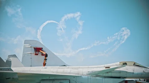 Reactive planes flying in the sky and performing the show with leaving smoke Video stock 116229446
