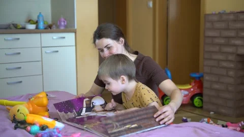 Read book to child Stock Footage 236406711