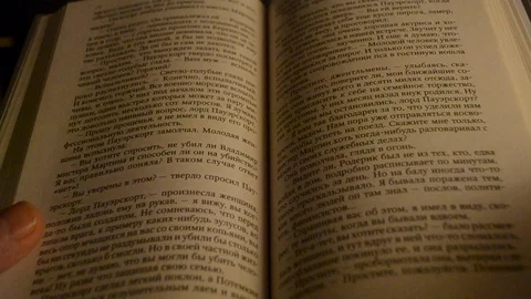 Read a book, scrolling pages Stock Footage 124168840