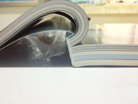 Read a book on table isolated. Stock Photos