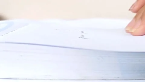 Read the first sentence on a book Stock Footage 146247923