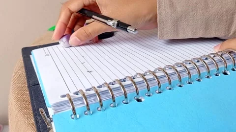 Read the first sentence on a book Stock Footage 146250968