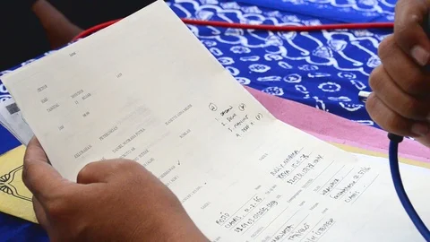 Read paper at the wedding ceremony Stock Footage 120905615