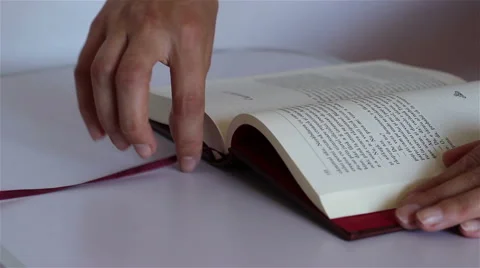 Reader Puts Bookmark on Page Stock Footage 46125118