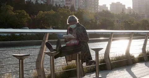 Readers on the Suzhou River Stock Footage 220389573