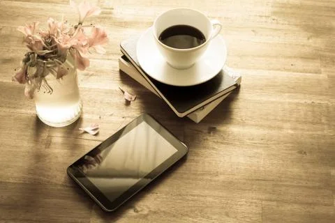 Reading and drinking coffee Stock Photos