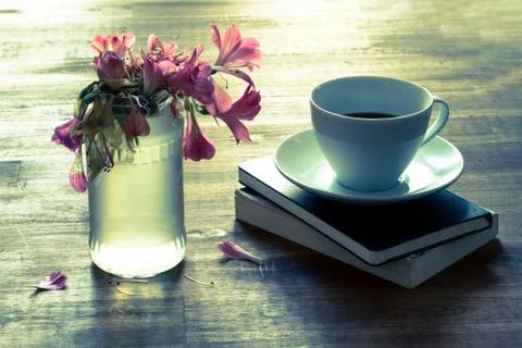 Reading  and drinking coffee Foto stock