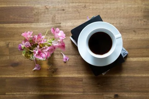 Reading  and drinking coffee Stock Photos