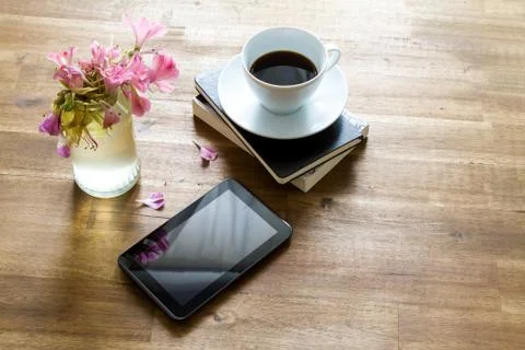 Reading and drinking coffee Stock Photos