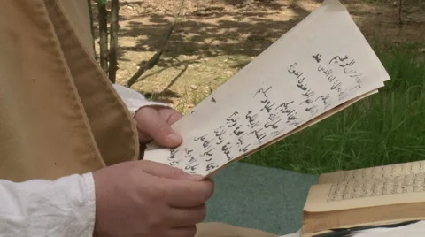 Reading Arabic Texts Stock Footage 46100416