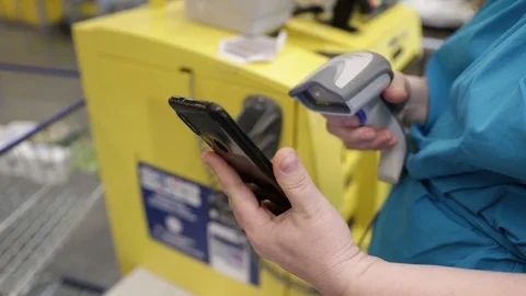 Reading a barcode from a telephone Stock Footage 113700638