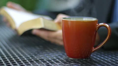 Reading Bible - Coffee Steaming Stock Footage 12288808