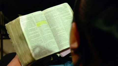 Reading the Bible Stock Footage 49659549