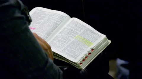 Reading the Bible Stock Footage 49659555