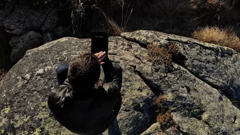 Reading The Bible in The Mountain Stock Footage 100333108