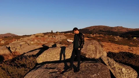 Reading The Bible In The Mountain Stock Footage 100333320