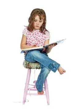 Reading A Big Book Stock Photos