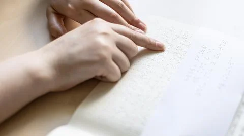 Reading book and note with braille text Stock Photos