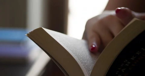 Reading book close-up slowmotion Stock Footage 64235064