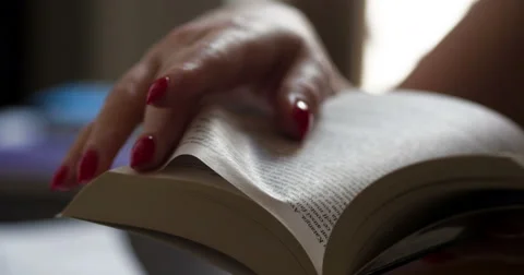 Reading book close-up slowmotion Stock Footage 64235067