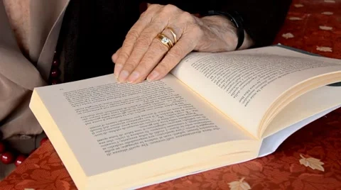 Reading a book Stock Footage 7761597