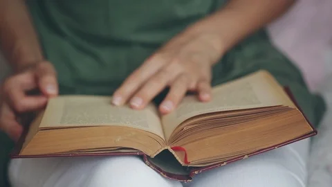 Reading a book Video stock 92536620