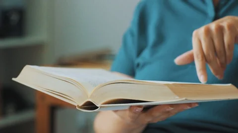 Reading a book Stock Footage 112186972