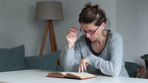 Reading a book Stock Footage 142932979