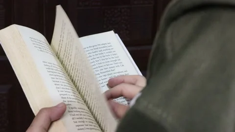 Reading a book. 库存影片 201817108