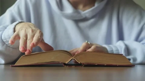 Reading a book Stock Footage 220575839