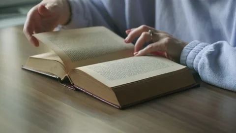 Reading a book Stock Footage 220576027