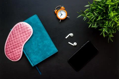 Reading book before going to bed. Sleeping accessories on the table, top view Foto stock
