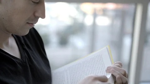 READING A BOOK AT HOME Stock Footage 86086430