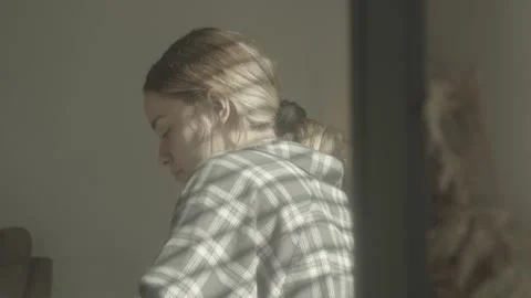 Reading book from home through mirror Stock Footage 144153314