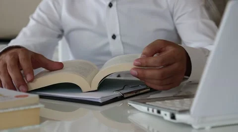 Reading book man in office 스톡 동영상 67831904