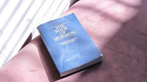 Reading a Book of Mormon Stock-Footage 20476101