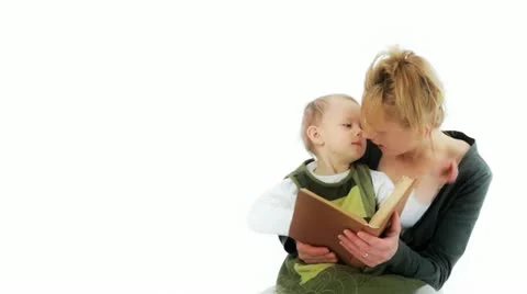Reading a book. Mother and her daughter. Bedtime story. Storybook. Stock Footage 10835168